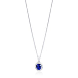 18ct White Gold Grain Set Oval Cut Sapphire and Round Brilliant Cut Diamond Halo Cluster Pendant and Chain