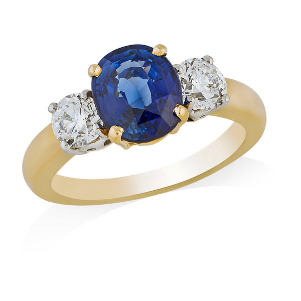 18ct Yellow and White Gold Three Stone Four Claw Set Oval Cut Sapphire and Round Brilliant Cut Diamond Ring