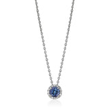 18ct White Gold Four Claw Set Round Cut Tanzanite and Round Brilliant Cut Diamond Halo Cluster Pendant and Chain