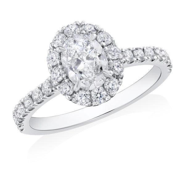 Platinum Four Claw Set Oval Cut Diamond and Round Brilliant Cut Halo Cluster Ring