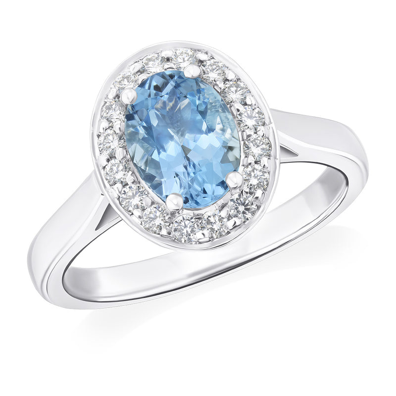 Platinum Four Claw Set Oval Cut Aquamarine and Round Brilliant Cut Diamond Halo Cluster Ring