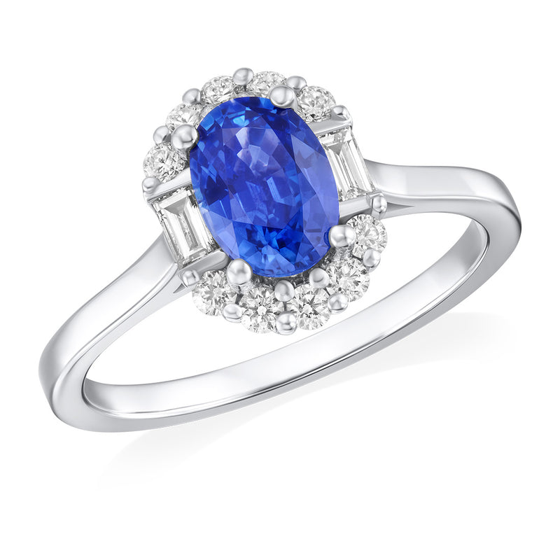 Platinum Four Claw Set Oval Cut Sapphire and Baguette Cut Diamond Halo Cluster Ring