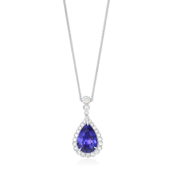 18ct White Gold Three Claw Set Pear Shaped Tanzanite and Round Brilliant Cut Diamond Halo Cluster Drop Pendant and Chain