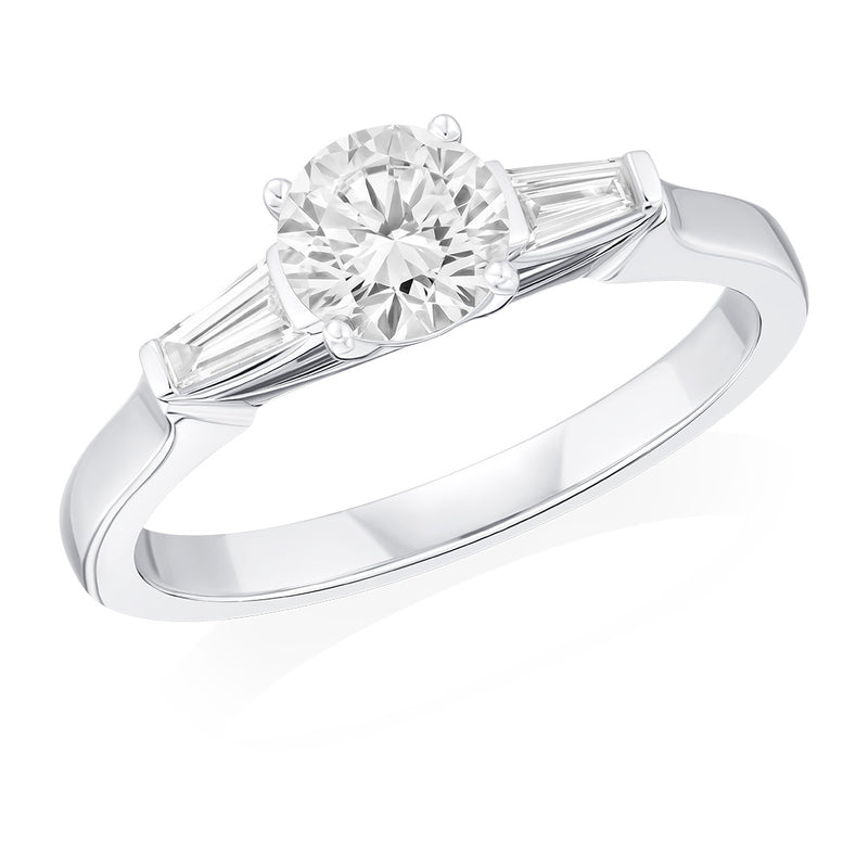 Platinum Three Stone Four Claw Set Round Brilliant Cut Diamond and Tapered Baguette Diamond Ring