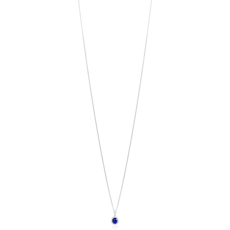 18ct White Gold Grain Set Oval Cut Sapphire and Round Brilliant Cut Diamond Halo Cluster Pendant and Chain