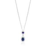 18ct White Gold Grain Set Oval Cut Sapphire and Round Brilliant Cut Diamond Halo Cluster Drop Pendant and Chain