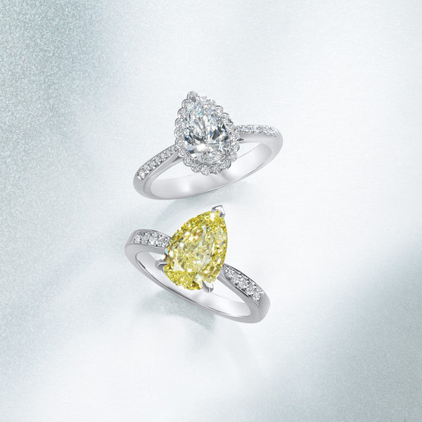 Platinum Solitaire Three Claw Set Pear Shaped Yellow Diamond Ring