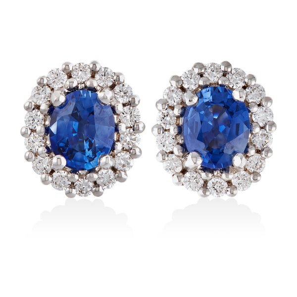 18ct White and Yellow Gold Four Claw Set Oval Cut Sapphire and Round Brilliant Cut Diamond Halo Cluster Stud Earrings