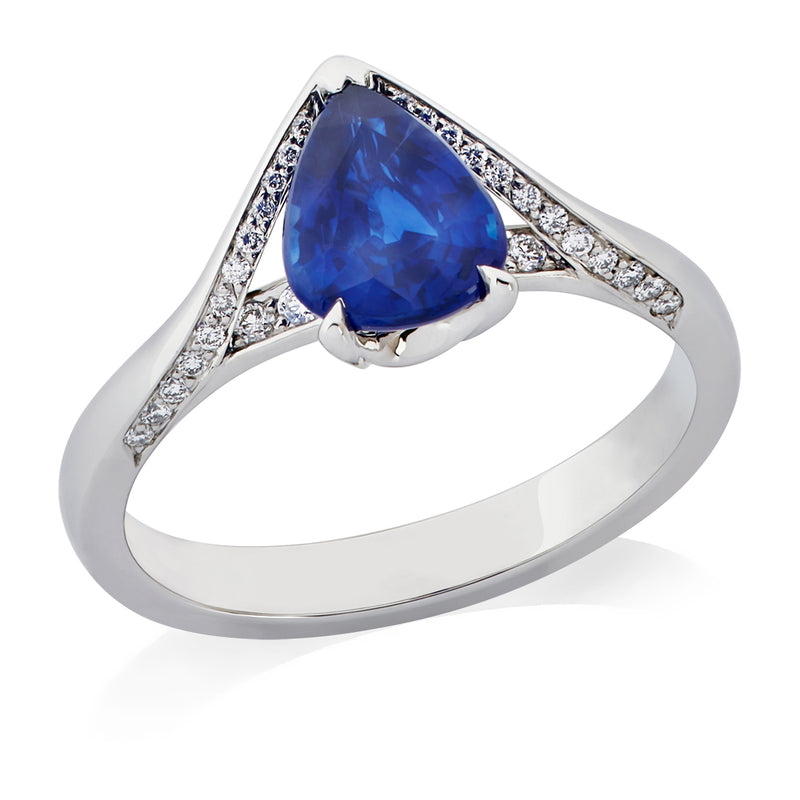 Platinum Solitaire Three Claw Set Pear Cut Sapphire Ring with Diamond Grain Set Shoulders