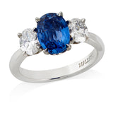 Mallory Victoria Platinum Three Stone Four Claw Set Oval Cut Sapphire and Oval Cut and Diamond Diamond Ring