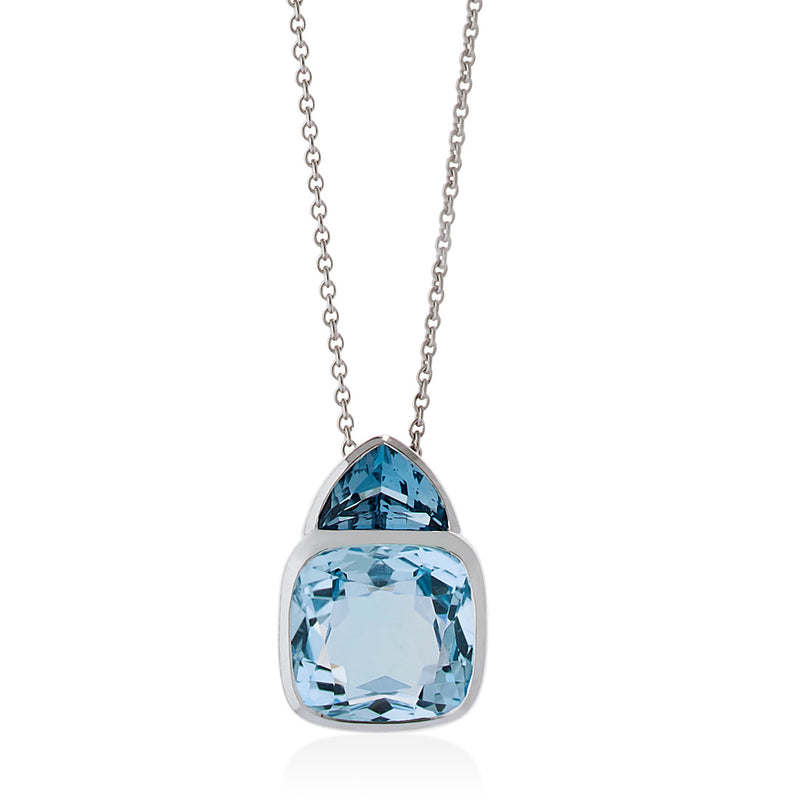 18ct White Gold Rub Set Cushion Cut Blue Topaz and Trapeze Cut London Blue Topaz Pendant and Chain