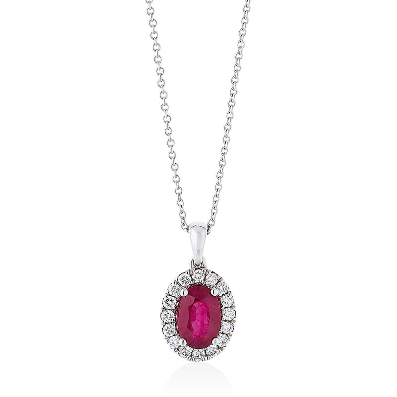 18ct White Gold Four Claw Set Oval Cut Ruby and Round Brilliant Cut Diamond Halo Cluster Pendant and Chain
