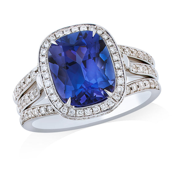 18ct White Gold Four Claw Set Long Cushion Cut Tanzanite and Diamond Halo Cluster Ring
