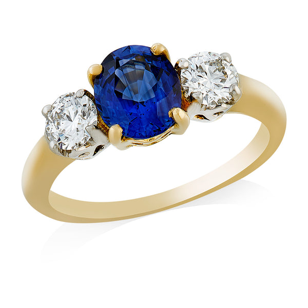 18ct Yellow and White Gold Three Stone Four Claw Set Oval Cut Sapphire and Round Brilliant Cut Diamond Ring