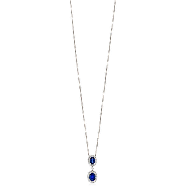 18ct White Gold Four Claw Set Oval Cut Sapphire and Round Brilliant Cut Diamond Halo Cluster Pendant and Chain