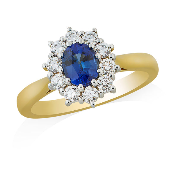 18ct Yellow and White Gold Ten Claw Set Oval Cut Sapphire and Round Brilliant Cut Diamond Cluster Ring