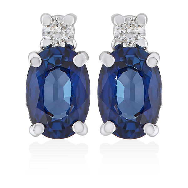 18ct White Gold Four Claw Set Oval Cut Sapphire and Round Brilliant Cut Diamond Stud Earrings