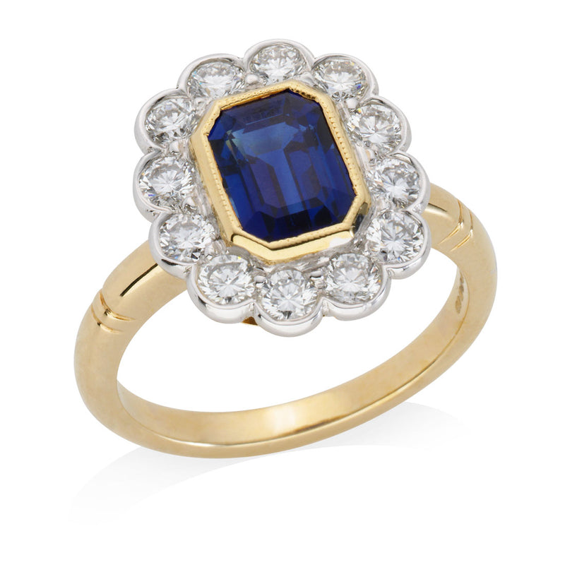 18ct Yellow and White Gold Milgrain Edge Rub Set Emerald Cut Sapphire and Diamond Halo Cluster Ring