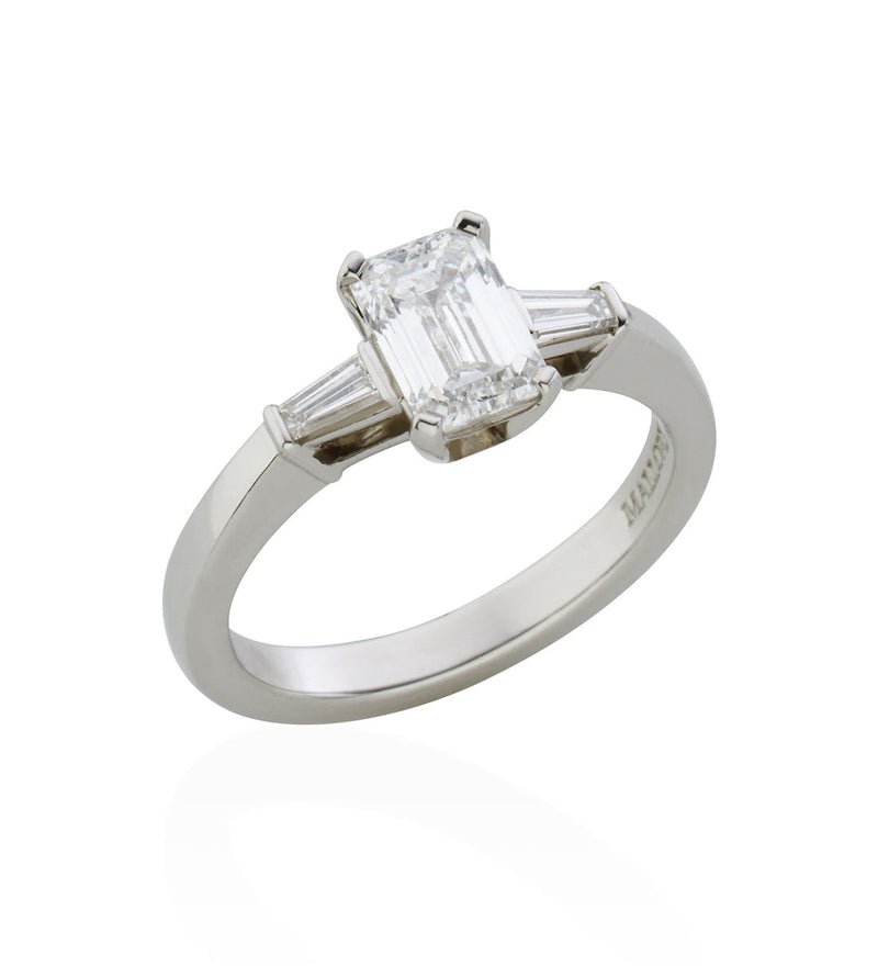 Platinum Single Stone Emerald Cut Diamond Ring with Tapered Baguette Diamond Shoulders