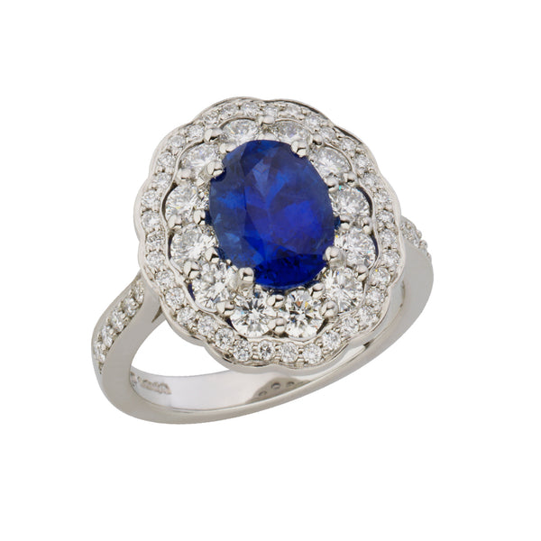 Platinum Four Claw Set Oval Cut Sapphire and Round Brilliant Cut Diamond Double Halo Cluster Ring