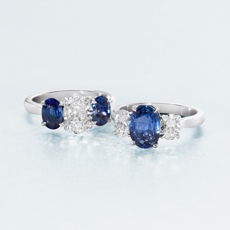 Mallory Victoria Platinum Three Stone Claw Set Oval Cut Diamond and Oval Cut and Sapphire Ring