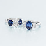 Mallory Victoria Platinum Three Stone Four Claw Set Oval Cut Sapphire and Oval Cut and Diamond Diamond Ring