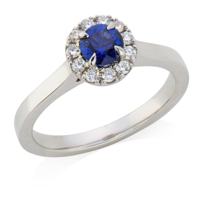 Platinum Round Cut Sapphire and Round Brilliant Cut Diamond Halo Cluster Ring