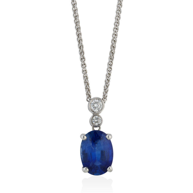 18ct White Gold Oval Cut Sapphire and Diamond Drop Pendant and Chain
