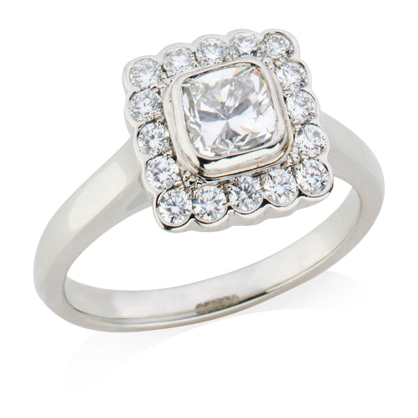 Platinum Rub Set Cushion Cut Diamond and Round Brilliant Cut Diamond Halo Cluster Ring